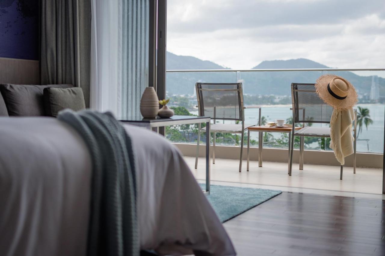 Oceanfront Beach Resort - Sha Extra Plus Patong Exteriör bild A bedroom at The View