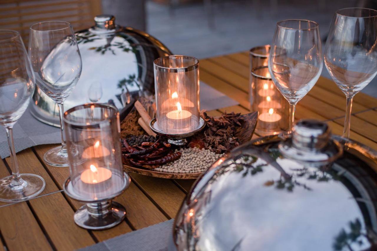 Oceanfront Beach Resort - Sha Extra Plus Patong Exteriör bild A table set for Shabbat