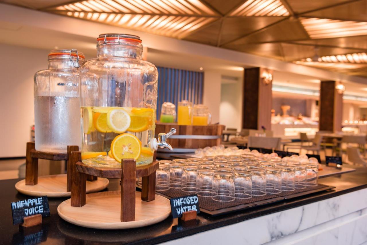 Oceanfront Beach Resort - Sha Extra Plus Patong Exteriör bild Infused water at a buffet