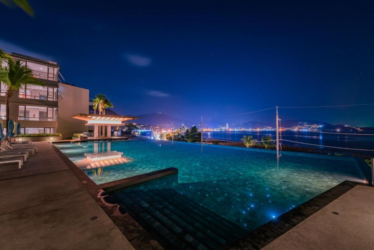 Oceanfront Beach Resort - Sha Extra Plus Patong Exteriör bild The swimming pool at The View