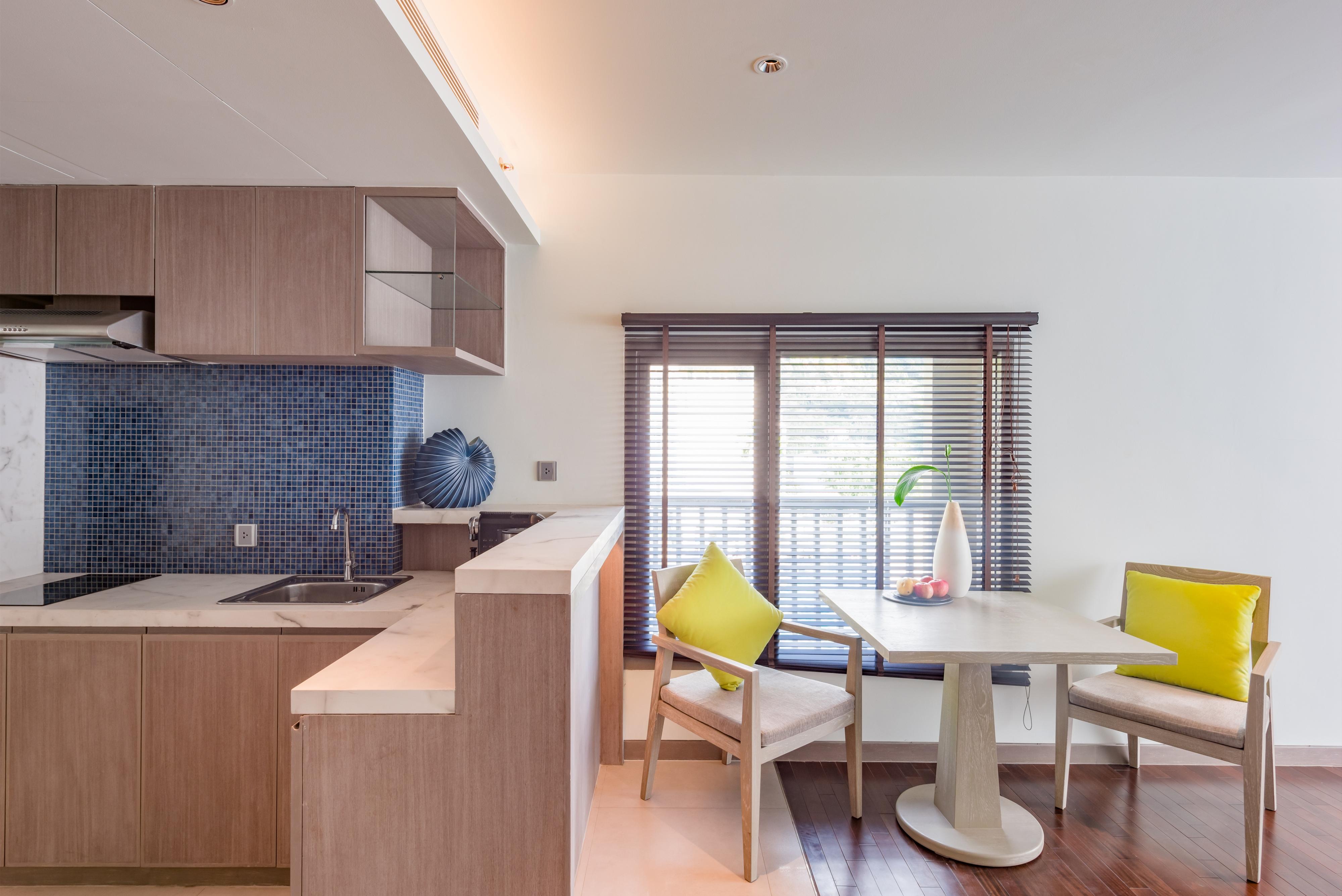 Oceanfront Beach Resort - Sha Extra Plus Patong Exteriör bild A kitchen in a serviced apartment in Hong Kong