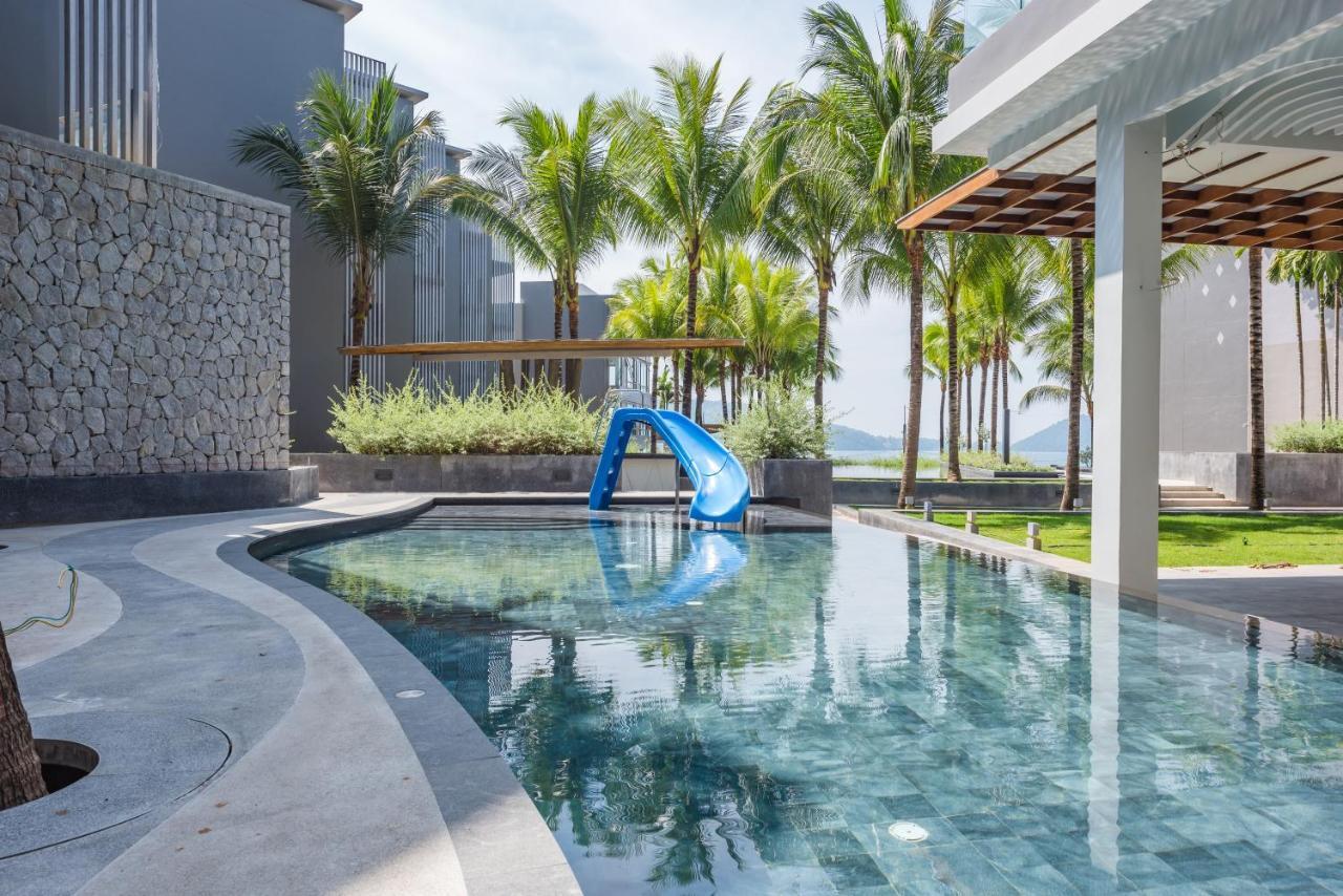 Oceanfront Beach Resort - Sha Extra Plus Patong Exteriör bild The swimming pool at the resort