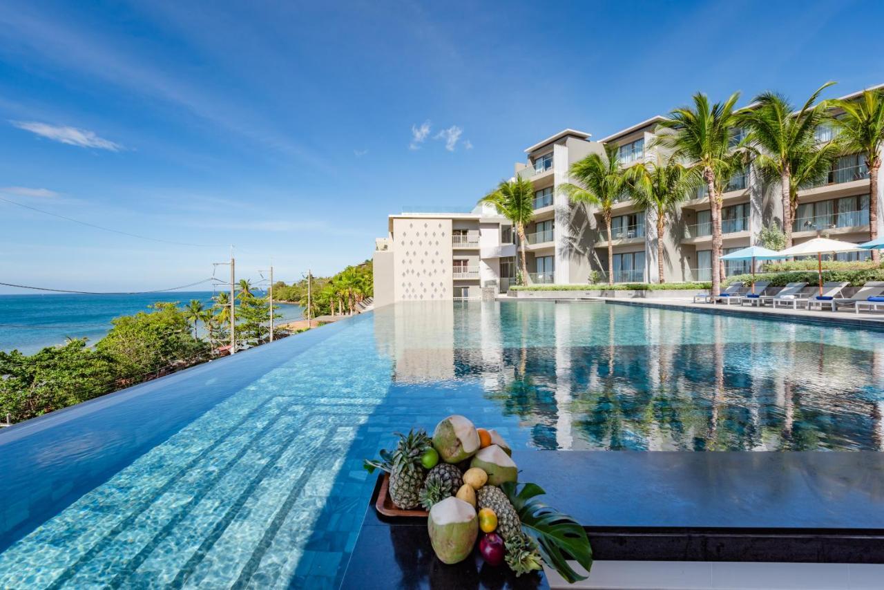 Oceanfront Beach Resort - Sha Extra Plus Patong Exteriör bild The resort's infinity pool